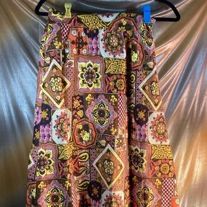 Vintage 70’s maxi skirt. Floral design in pink and brown with small pink buttons